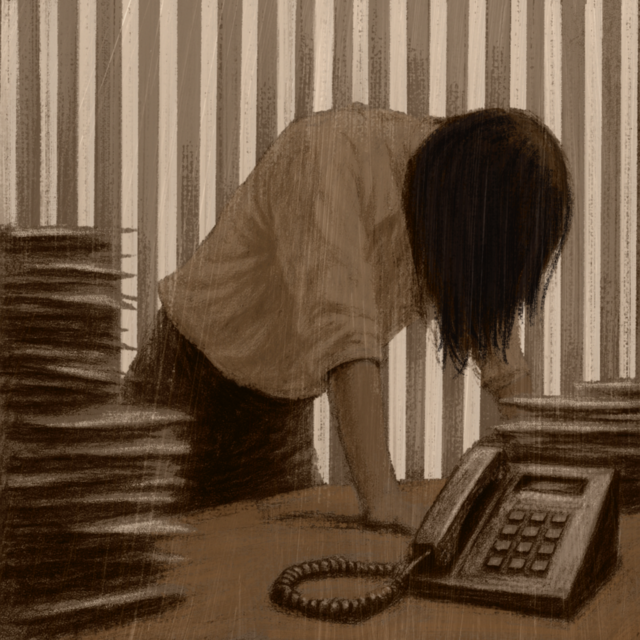 A person with long hair leans on a desk overwhelmed by tall stacks of papers and a landline telephone, set against vertical striped wallpaper.